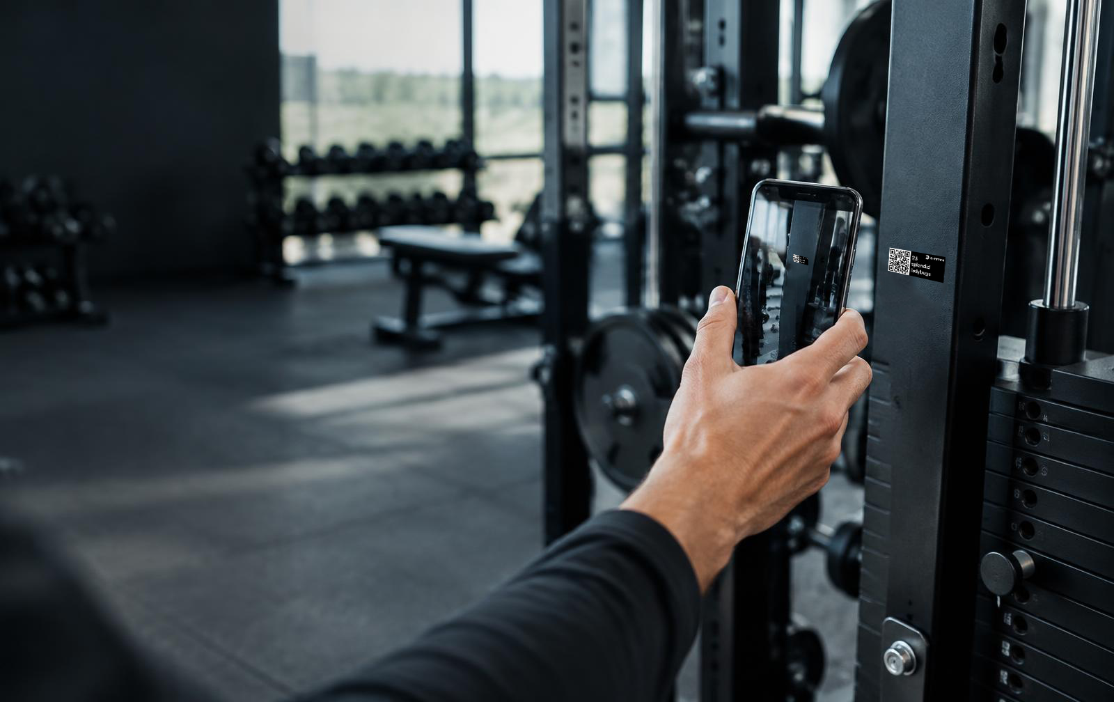 Scanning a QR label on a physical gym asset with the D-Fetch Installation App